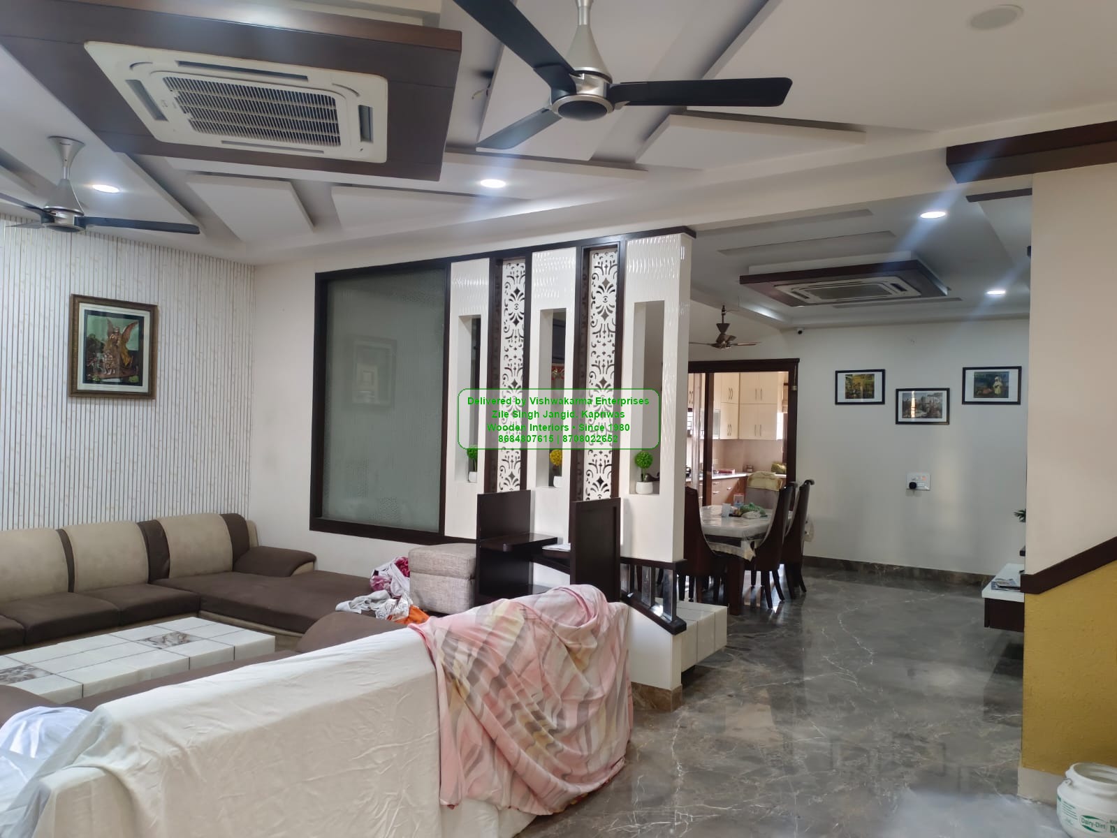 Open kitchen-cum-dining reference with partition and false ceiling