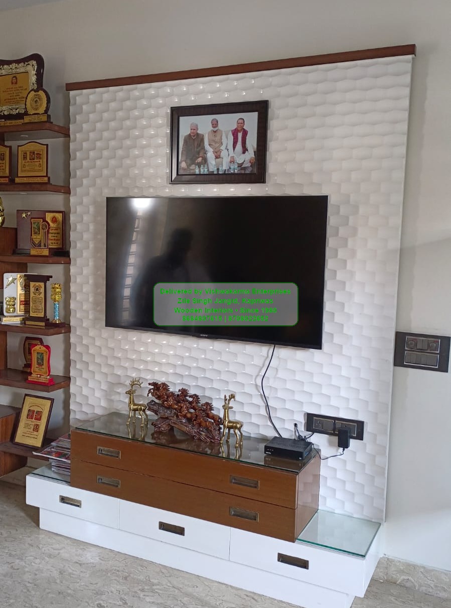 TV unit with white 3D honeycomb back panel and brass deer figurines